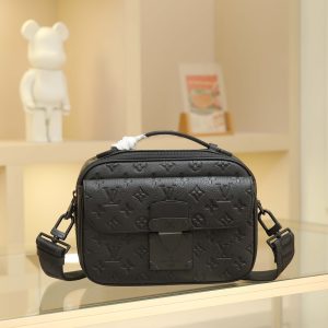 This S Lock messenger bag is crafted from supple Taurillon leather in an elegant black hue, accented with the House's iconic Monogram embossed pattern. The magnetic closure, inspired by Georges Vuitton's 1886 trunk lock design, offers a modern touch while ensuring secure storage.Featuring a trunk-style handle and LV monogrammed shoulder strap for easy carrying. Monogram embossed Taurillon calf leather with Epi leather trim and lining. Matte black metal hardware. Leather handle with V-stitching and embossed logo. Interior pocket. Removable, adjustable shoulder strap! Dimensions: 22x18x8CM